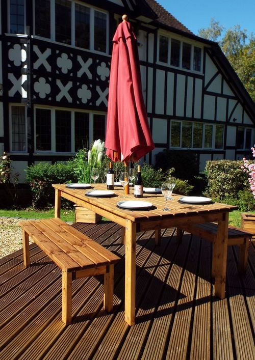 Charles Taylor solid wood outdoor six seater (2 bench) and dining table set